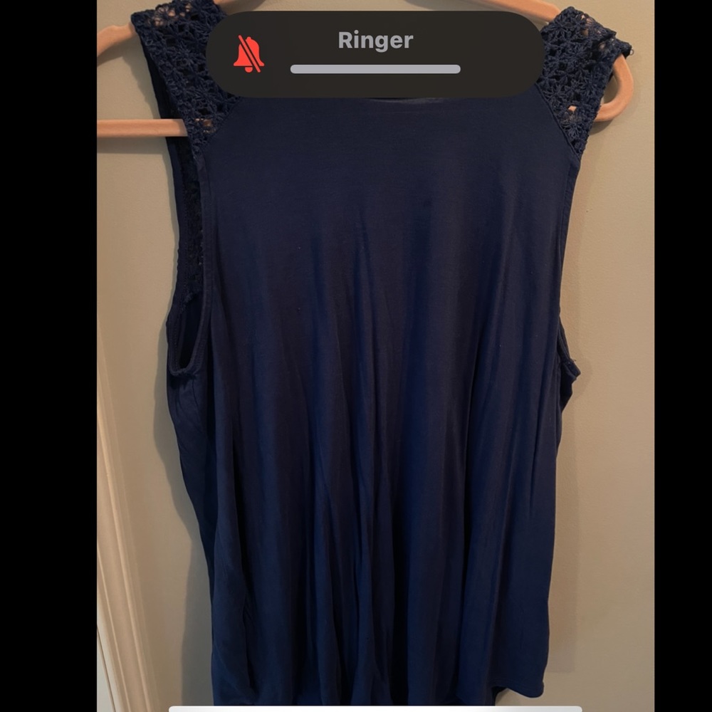 navy shirt the top has decoration and is kinda see through with the decorations